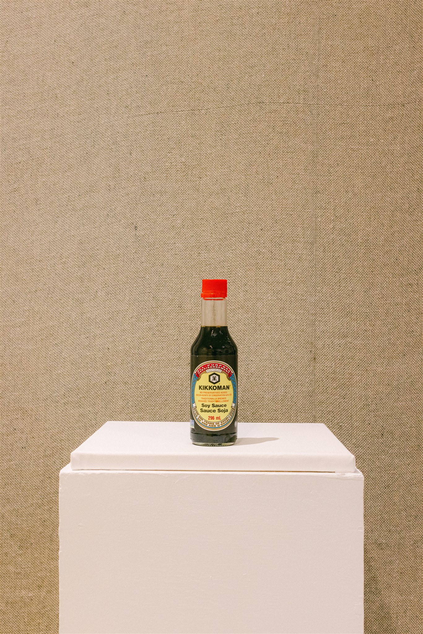 Soy Sauce bottle on gallery plinth