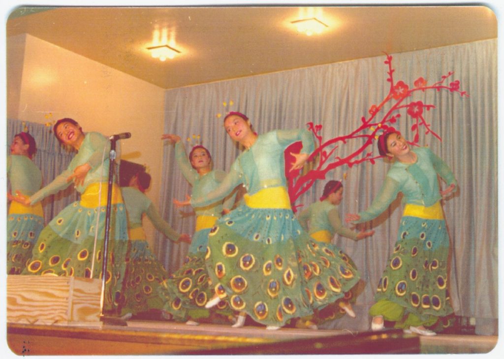 vintage photo of dancers performing Chinese peacock dance